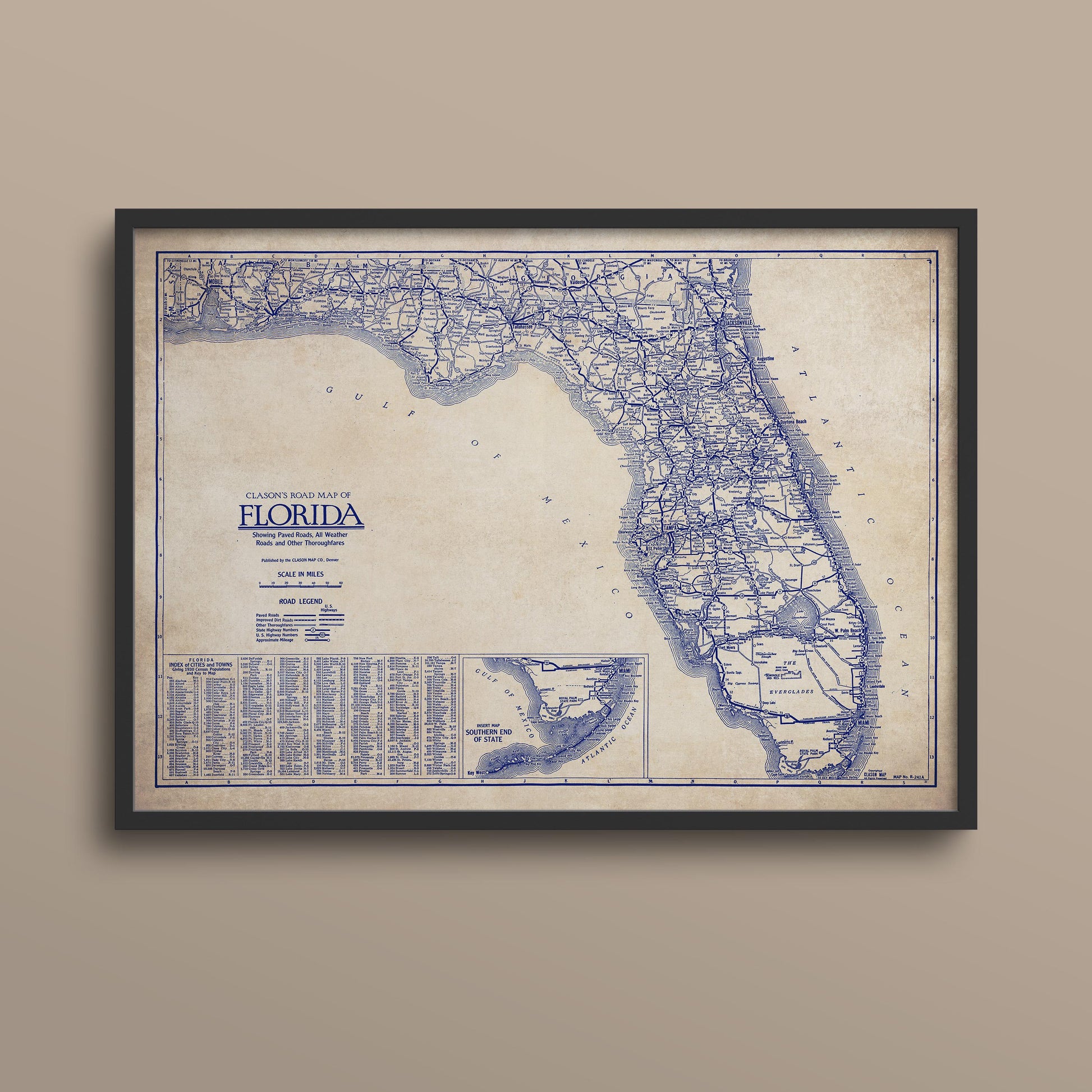 The image is a framed vintage map of Florida, showing the state's roads and highways in blue and white.