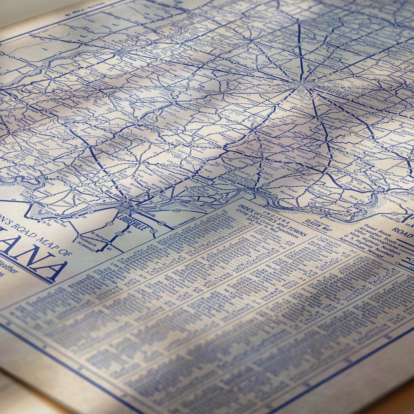 The image is a detailed map of a region, likely a part of a larger collection of maps. The map is predominantly blue and white, with various lines and symbols representing roads, railways, and other geographical features. The map appears to be a vintage or historical map, as indicated by the presence of a legend or key. The image does not contain any text that can be described in fewer than 500 characters, and it does not include any specific details about the content or purpose of the map.