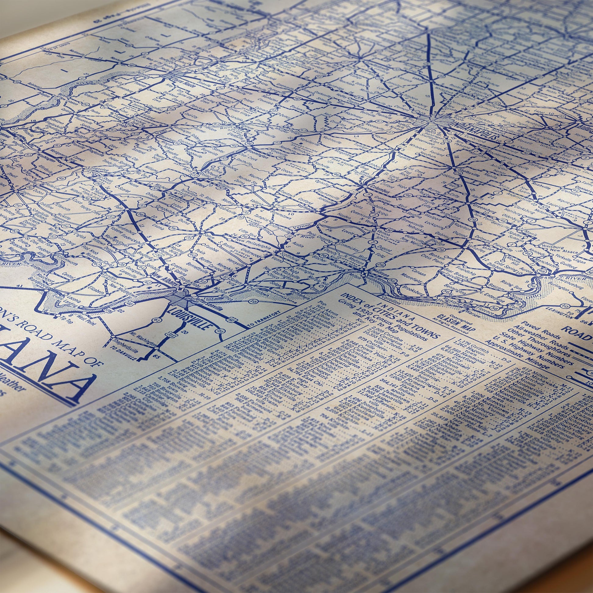 The image is a detailed map of a region, likely a part of a larger collection of maps. The map is predominantly blue and white, with various lines and symbols representing roads, railways, and other geographical features. The map appears to be a vintage or historical map, as indicated by the presence of a legend or key. The image does not contain any text that can be described in fewer than 500 characters, and it does not include any specific details about the content or purpose of the map.