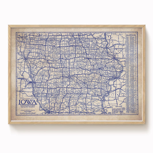 The image is a framed vintage map of Iowa, showing the state's roads and highways in a detailed and intricate manner.