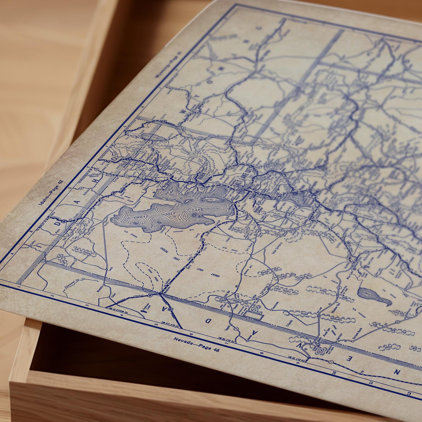 The image is a close-up of a map with various symbols and lines representing geographical features and routes.
