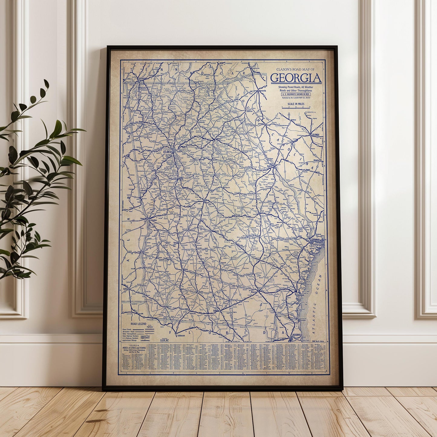 a framed map of Georgia, with a detailed blue and white color scheme.