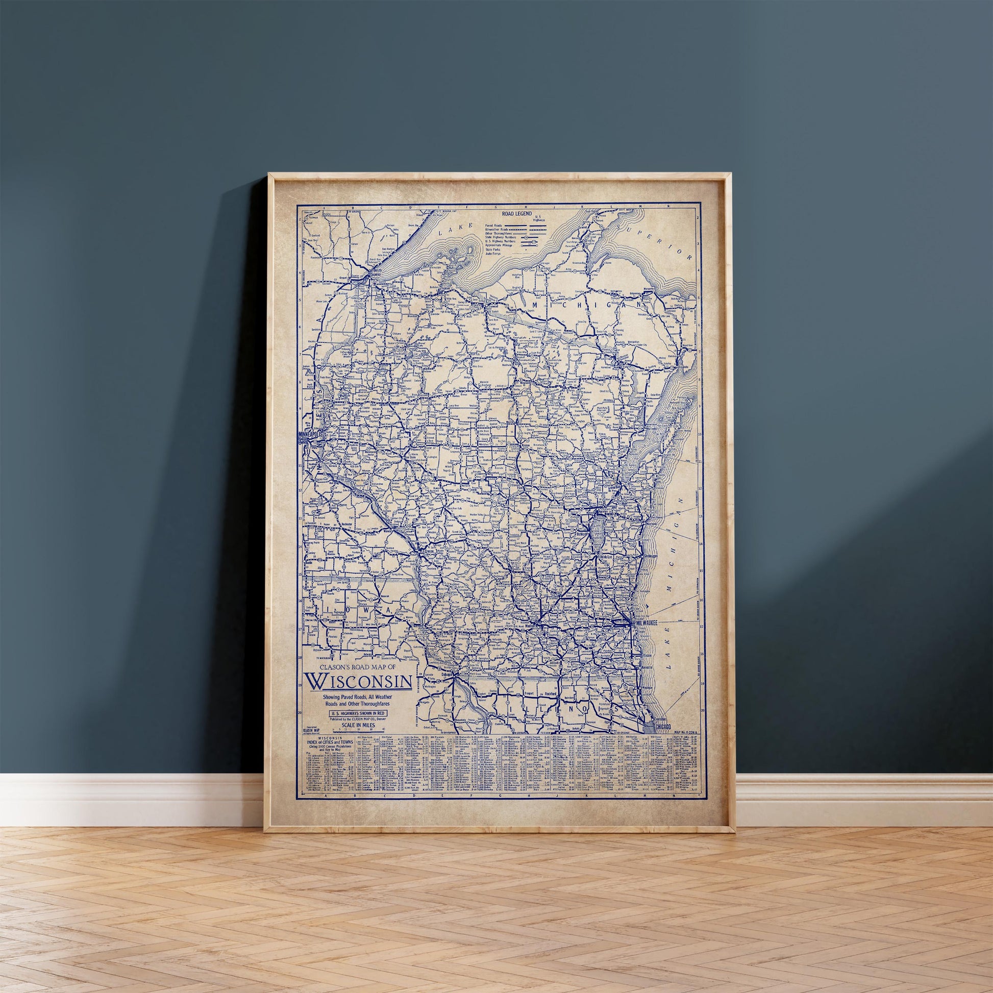 a framed map of Wisconsin, with a blue and white color scheme.