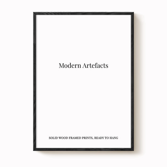 The image is a black framed print with the text "Modern Artifacts" and "SOLIDWOOD FRAMED PRINTS, READY TO HANG" printed on it.